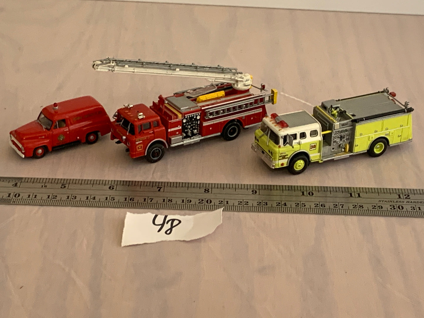 Diecast HO scale ladder pumper truck (lot of 3)