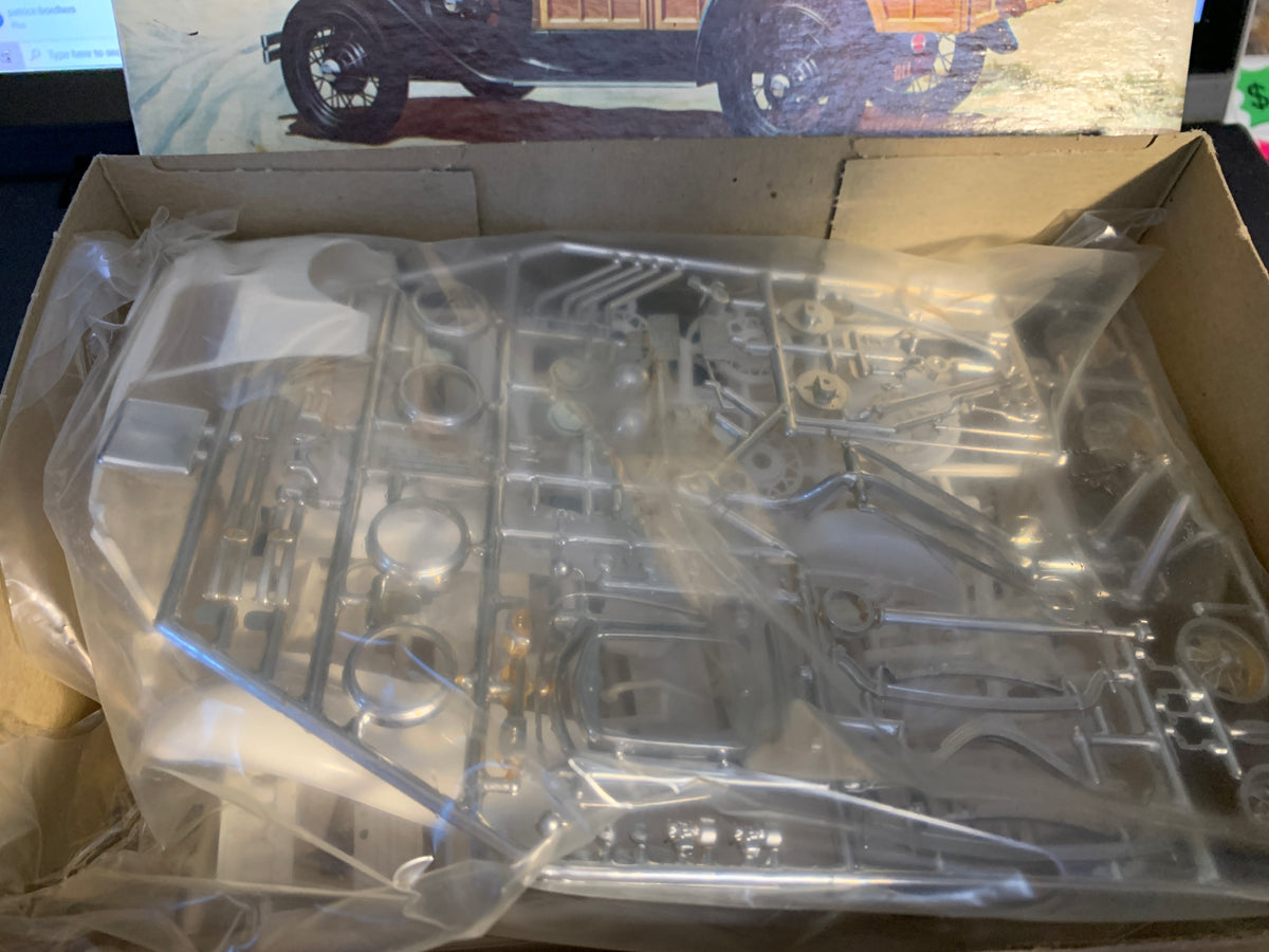 Revell 1931 Ford Woody or Tudor Sedan kit #H-1275:200 is the original 1964 issue, 1/25 scale.