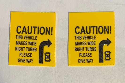 Caution This vehicle makes wide right turns Mud Flaps Dimensional decal