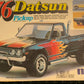 The MPC #1-7608 1976 Datsun Pickup is an original 1976 1/25-scale kit.