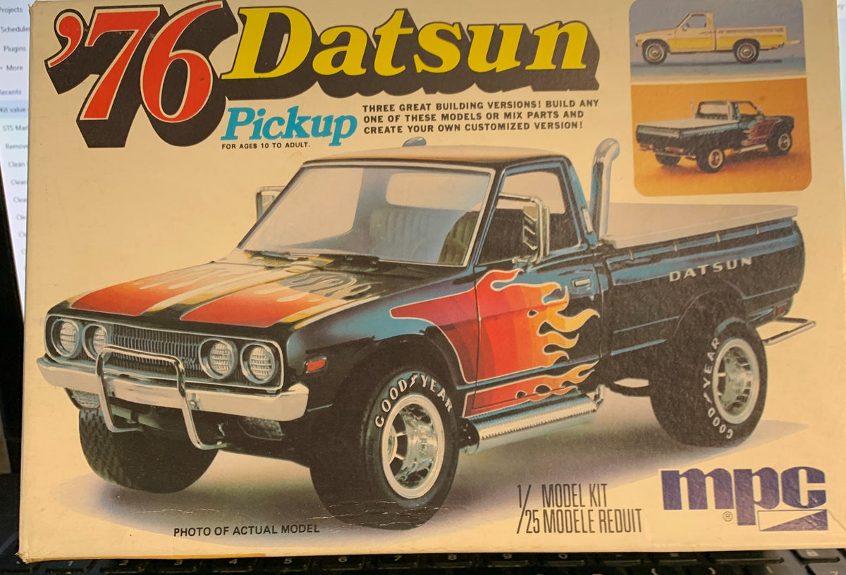 The MPC #1-7608 1976 Datsun Pickup is an original 1976 1/25-scale kit.