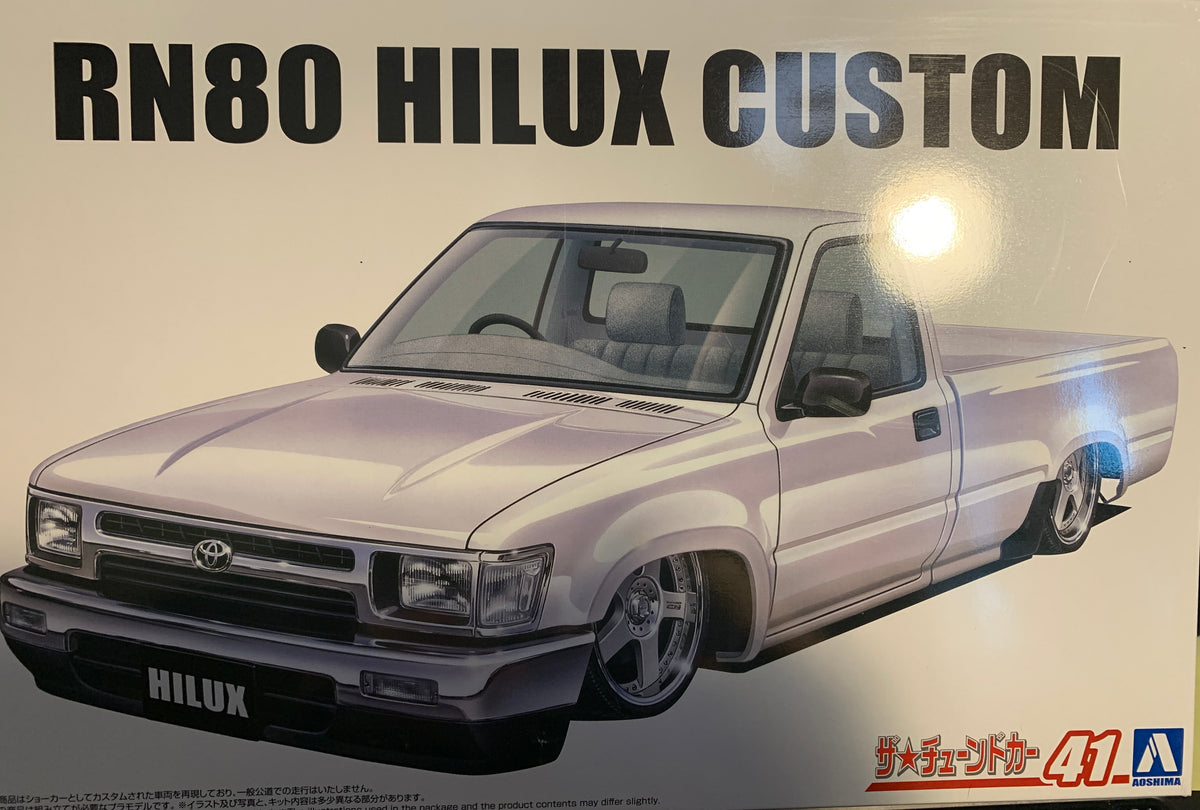 Aoshima #20090 RN80 Hilux Custom is a 1/24 scale Toyota pickup kit.